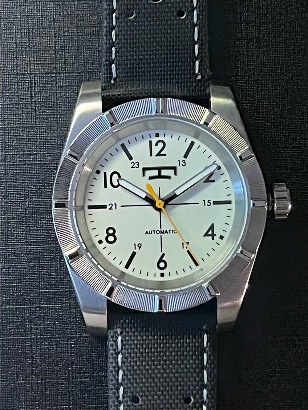 Automatic Stainless Steel Watch with White Dial and Yellow Seconds Hand